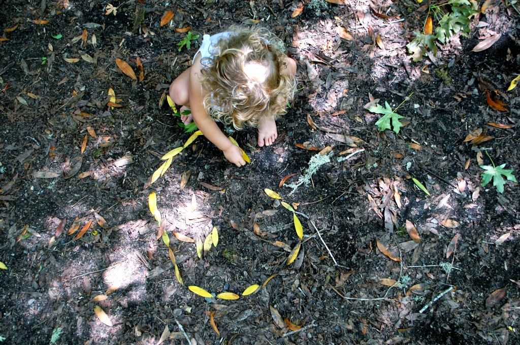 Child building Leaf Land Art Circle