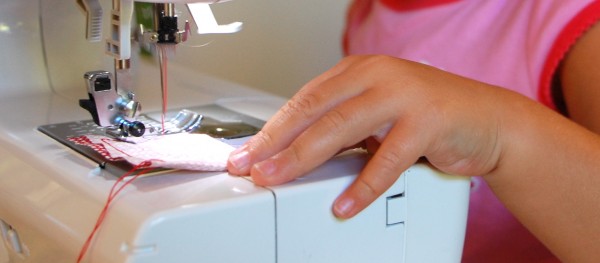 machine sewing with a preschooler
