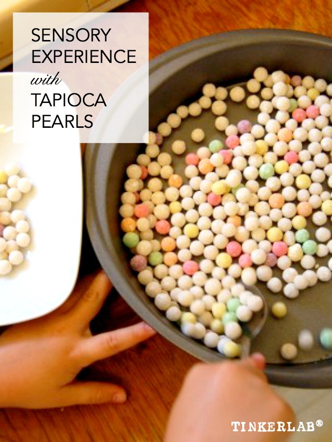 Sensory experience with tapioca pearls TinkerLab