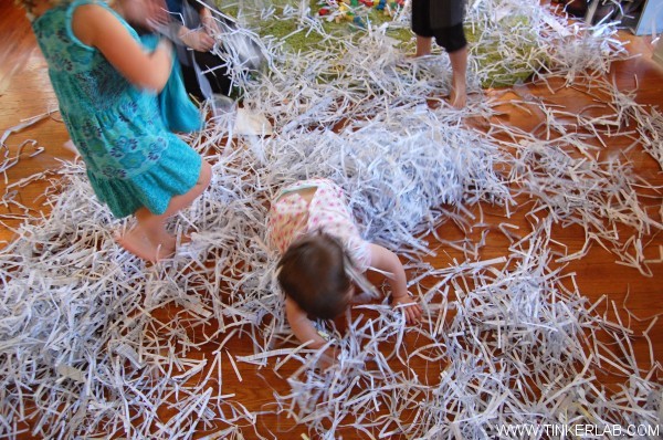 play in shredded paper with kids