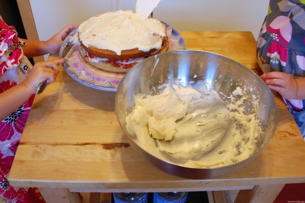 frosting cake with kids