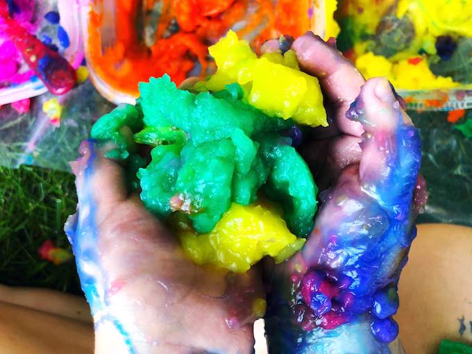 messy sensory art with homemade gel paint