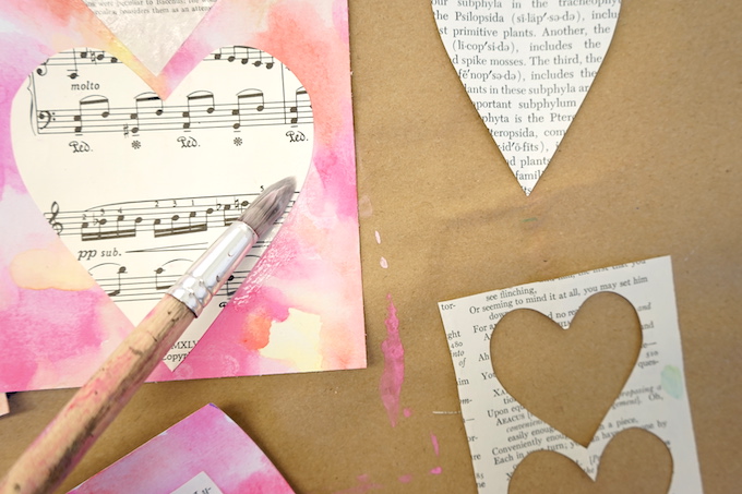 Make Collage Hearts on watercolor paper in four sections - TinkerLab